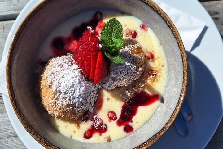 Traditional South Tyrolean dessert served at a mountain hut during a culinary ski day