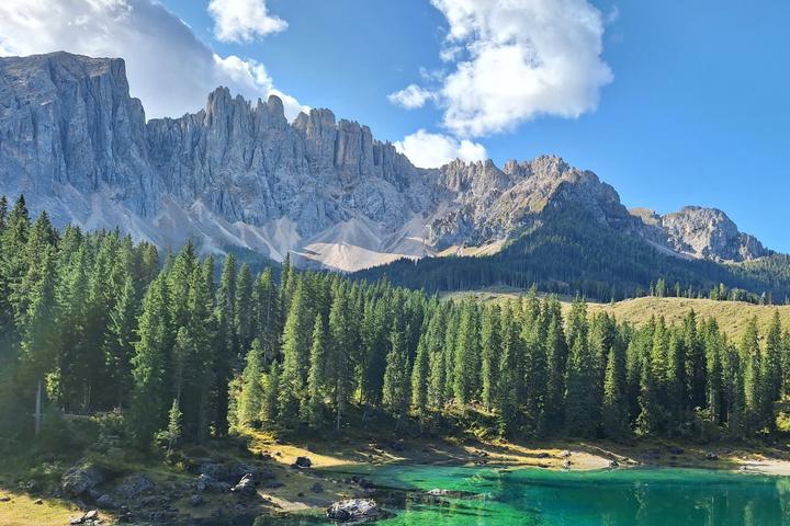 Lake Carezza with the Latemar mountains in the Dolomites