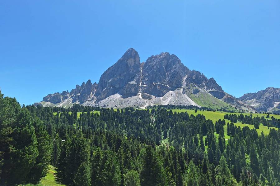 Sass de Putia above green meadows in Val di Funes